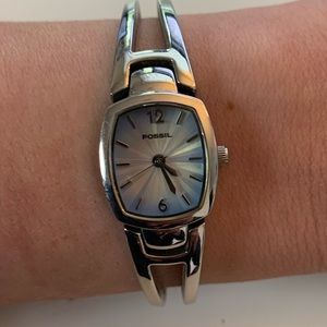 Stainless steel women’s Fossil watch.